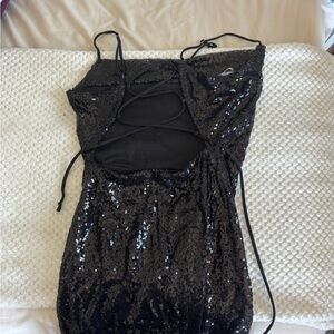 Sparkly black open back dress